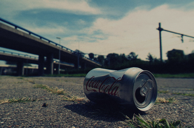 Soda can lying on the road